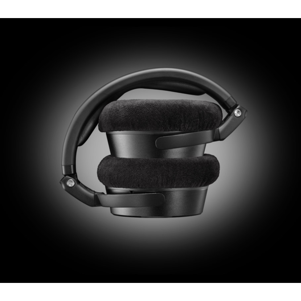 Neumann NDH headphones in a folded position, highlighting their robust, travel-friendly design with articulated earcups and premium build quality for on-the-go professionals.