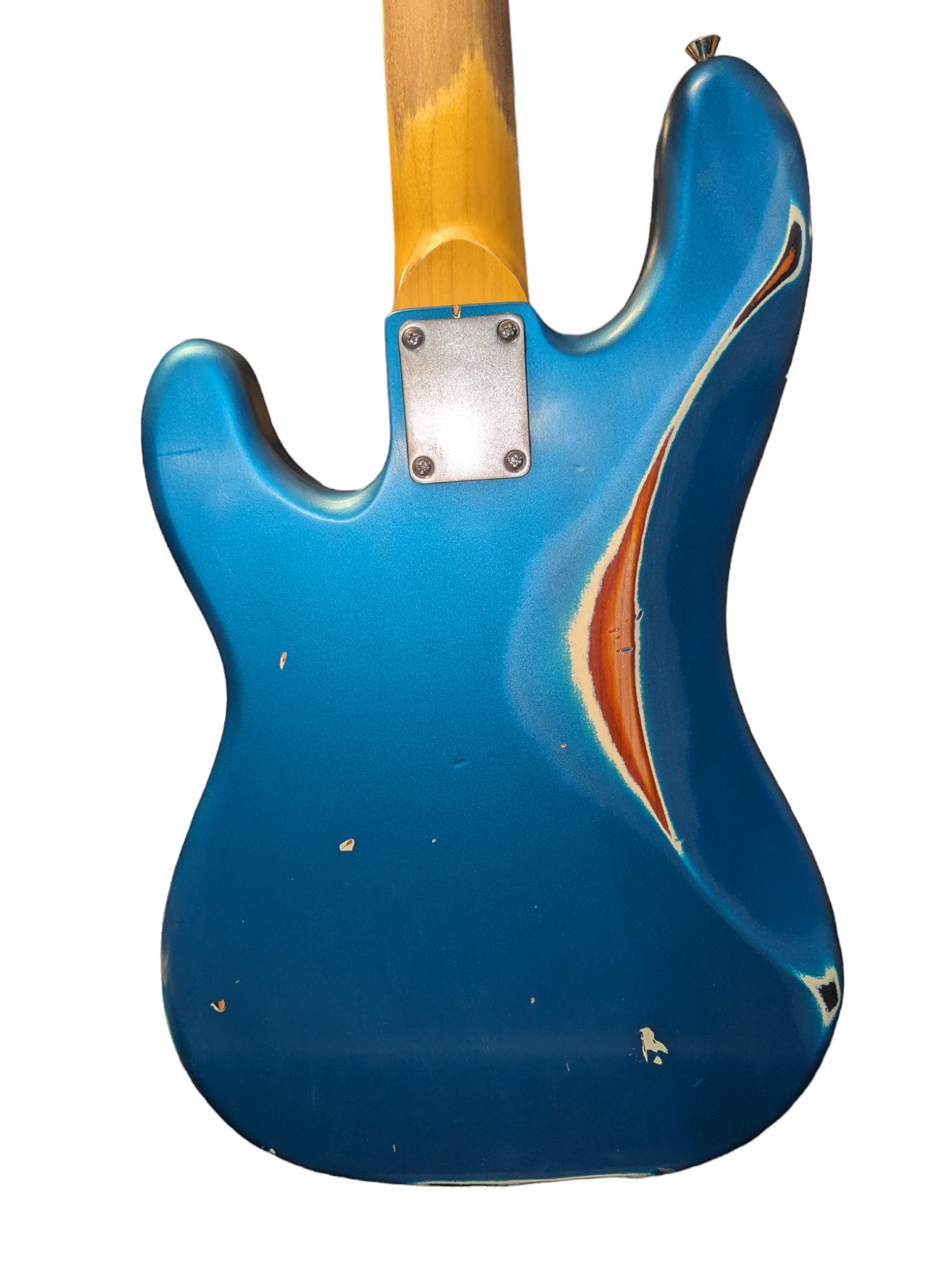 Back of a Nash bass guitar with a worn blue finish, revealing natural wood through areas of distress.